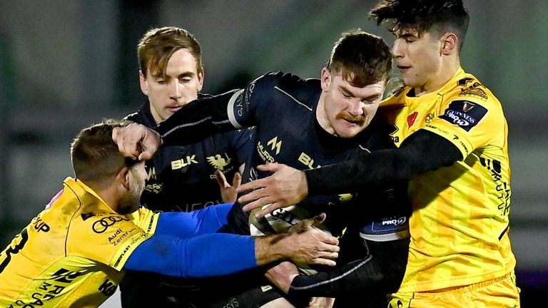 4 December 2020; Peter Sullivan of Connacht is tackled by Tommaso Benvenuti and Tommaso Menoncello of Benetton during the Guinness PRO14 match between Connacht and Benetton at the Sportsground in Galway. Photo by Harry Murphy/Sportsfile