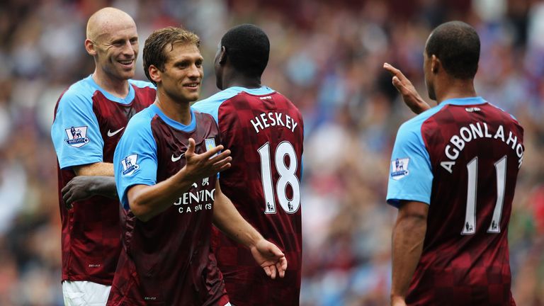 Stiliyan Petrov congratulates team mate Gabriel Agbonlahor (#11) of Aston Villa after he sets up the second goal for Emile Heskey (#18) during the Barclays Premier League match between Aston Villa and Blackburn Rovers at Villa Park on August 20, 2011 in Birmingham, England