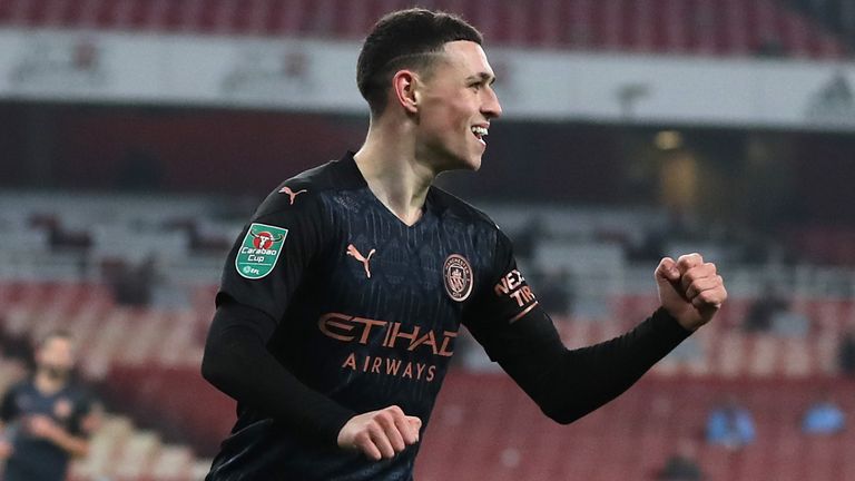 Phil Foden celebrates after putting Manchester City 3-1 up against Arsenal