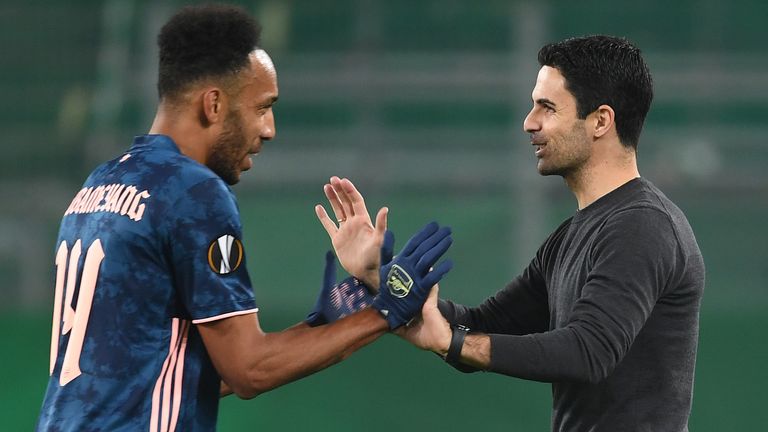 Arsenal manager Mikel Arteta with captain Pierre-Emerick Aubameyang after the UEFA Europa League Group B stage match between Rapid Wien and Arsenal FC at Allianz Stadion on October 22, 2020 in Vienna, Austria. (Photo by Stuart MacFarlane/Arsenal FC via Getty Images)