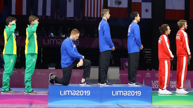 US fencer Race Imboden took a knee during the medal ceremony at the 2019 Pan-Am Games in Peru