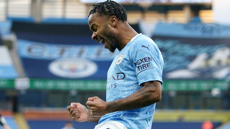 Raheem Sterling of Manchester City celebrates after scoring his team's first goal during the Premier League match between Manchester City and Fulham