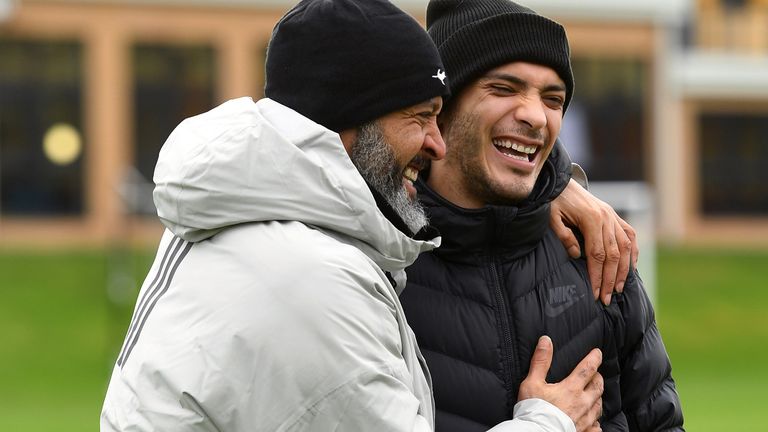 Raul Jimenez laughs with Nuno Espirito Santo as he visited Wolves' training ground following his discharge from hospital after suffering a fractured skull against Arsenal