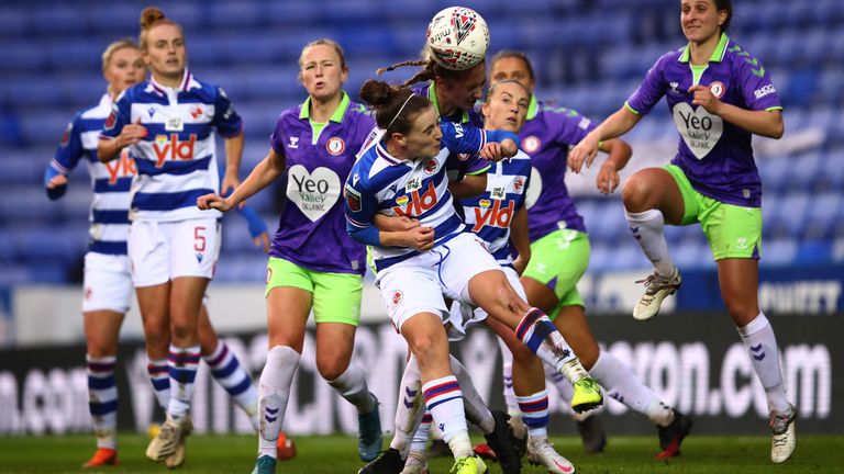 Reading's Lauren Bruton  battles for the ball in the penalty area