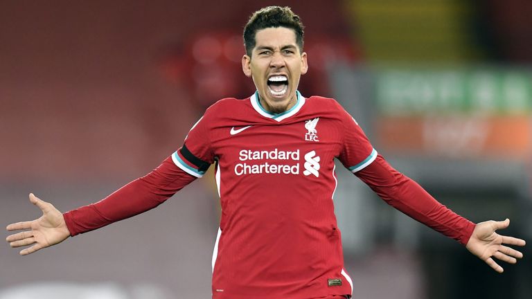Roberto Firmino celebrates his late winner against Spurs