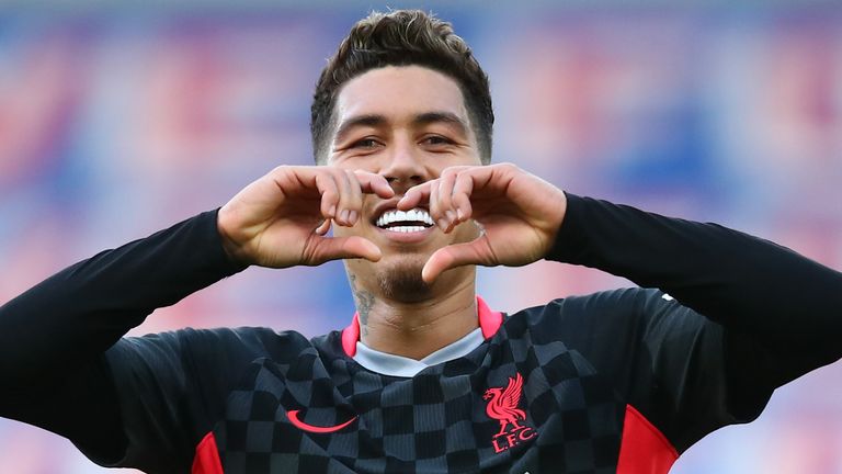 Roberto Firmino celebrates after scoring Liverpool's third goal against Crystal Palace