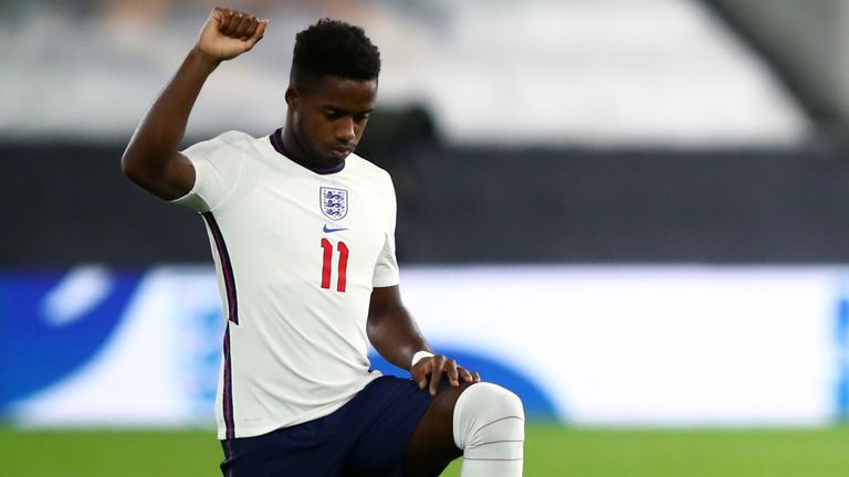 Ryan Sessegnon takes a knee before an England U21 match