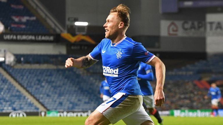 Arfield wheels away in delight after his winning strike on 63 minutes