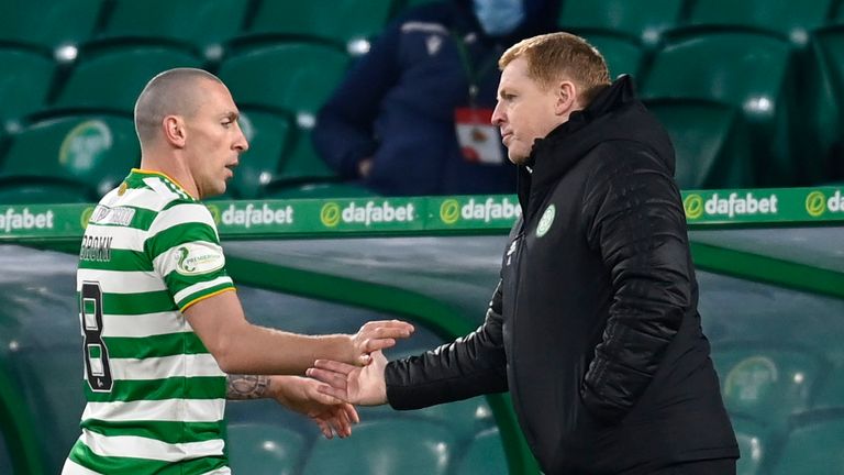 Celtic captain Scott Brown shakes hands with manager Neil Lennon