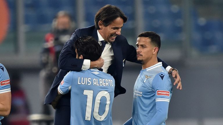 Simone Inzaghi celebrates with his players after Lazio's second goal