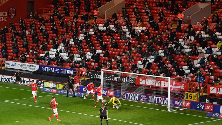 fans look on from their socially distanced position in the stands during the Sky Bet League One match between Charlton Athletic and Milton Keynes Dons