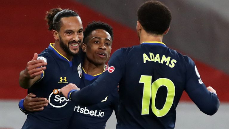 Theo Walcott celebrates his goal with team-mates