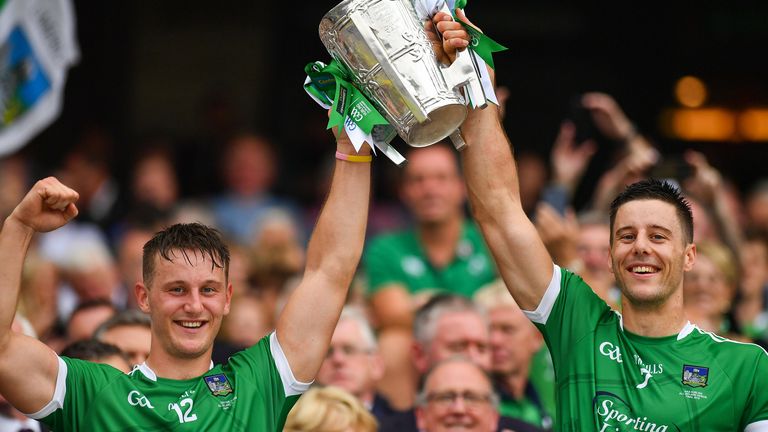 Tom and Dan Morrissey lift the Liam MacCarthy Cup in 2018