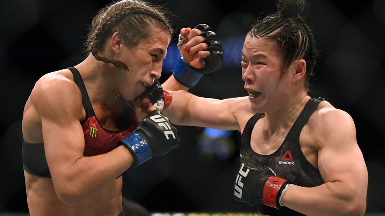 Weili Zhang punches Joanna Jedrzejczyk to a split decision win at T-Mobile Arena on March 07, 2020 in Las Vegas, Nevada.