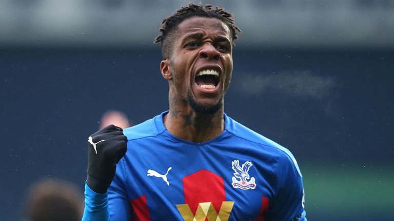 Wilfried Zaha celebrates after Darnell Furlong's own goal gives Crystal Palace the lead at West Brom