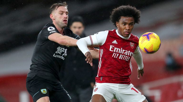 Arsenal's Willian (right) and Burnley's Charlie Taylor in Premier League action at the Emirates Stadium