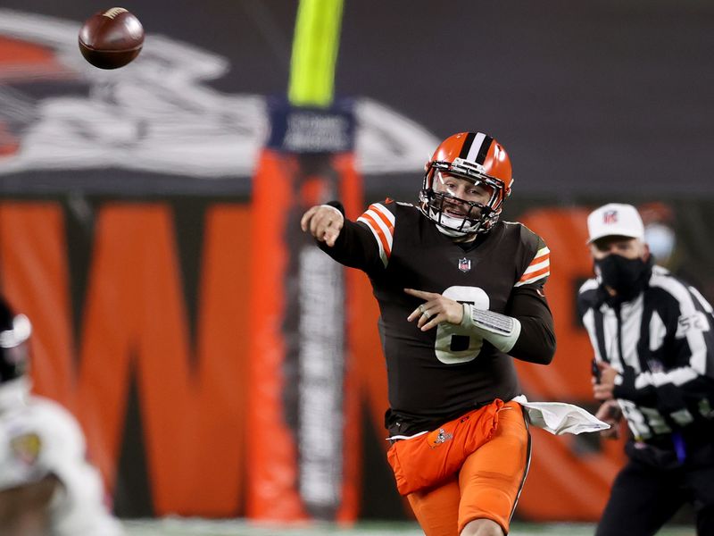 Lamar Jackson comes storming out of the locker room to beat the Browns, 47- 42, in a wild shootout with Baker Mayfield 