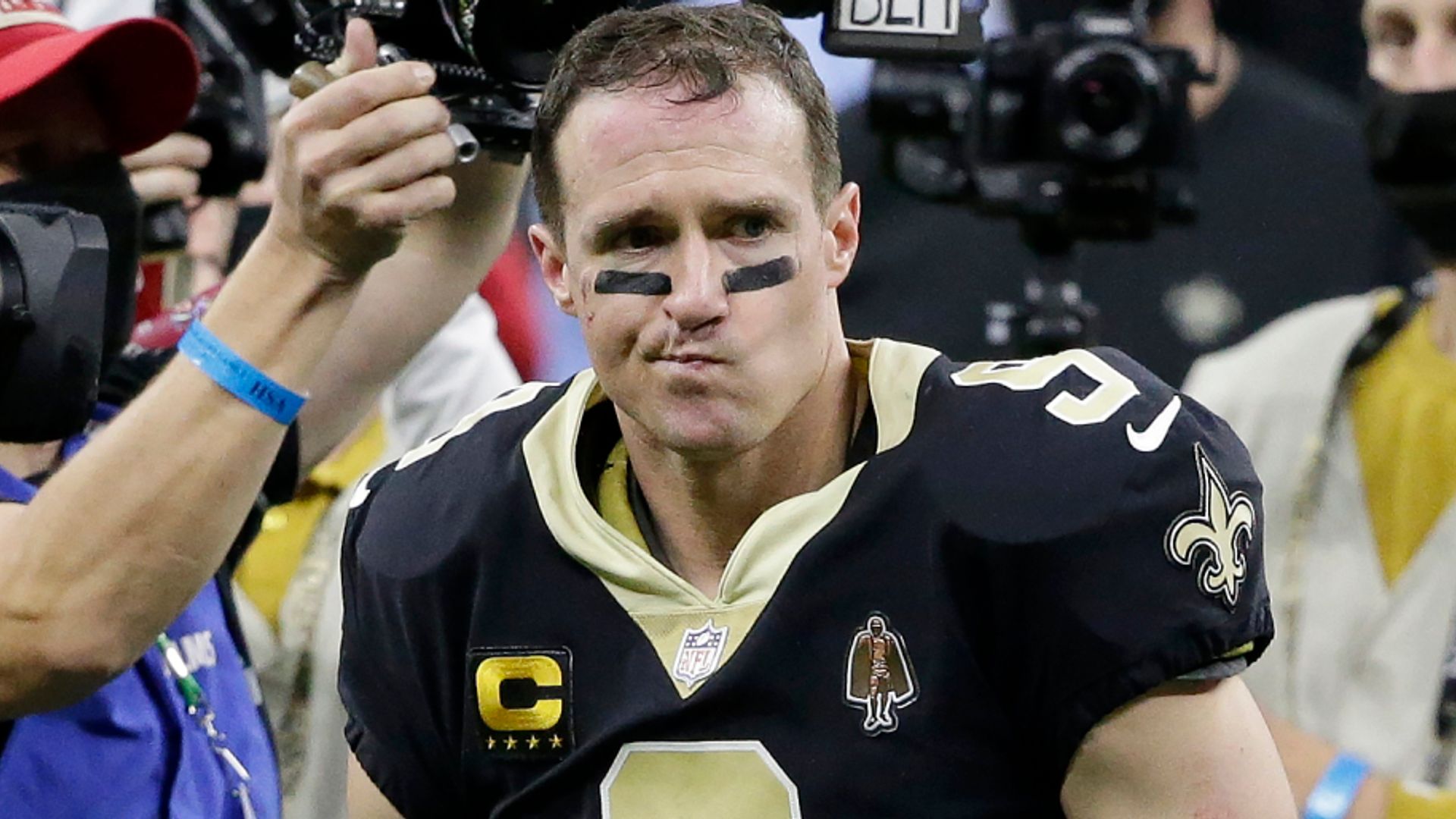 Brees throws three picks as Brady's Bucs advance