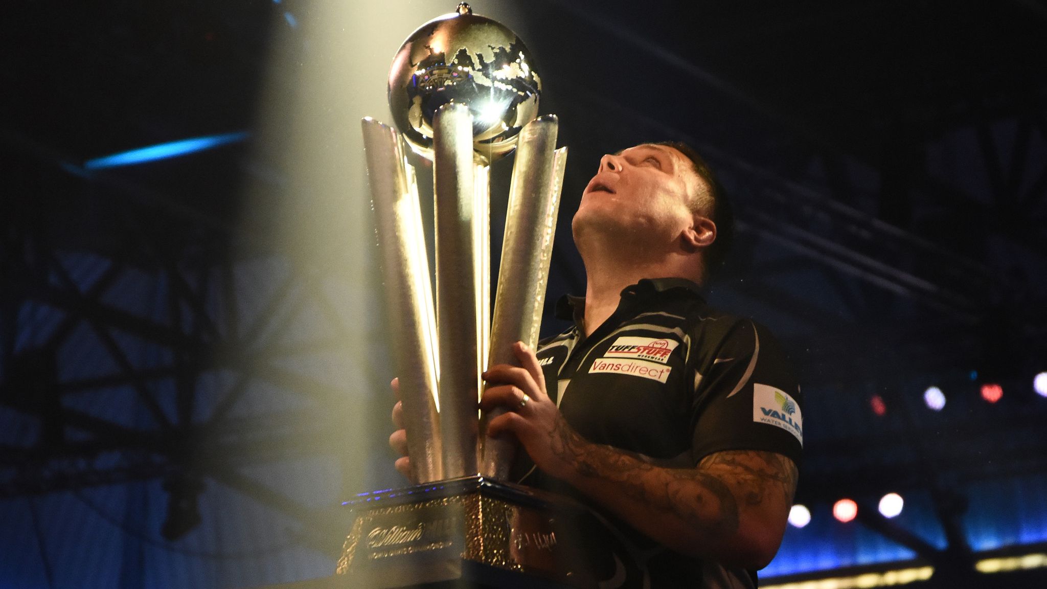 Price wins maiden PDC World Darts Championship title and tops rankings