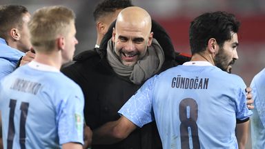 Pep Guardiola celebrates after Man City's win over Man Utd