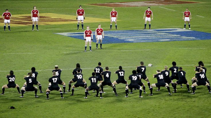 FILE - In this Saturday, June 25, 2005 file photo, the British and Irish Lions captain Brian O'Driscoll, centre, stands with his teammates as they watch the All Blacks perform a haka prior to the start of the first rugby union test at Lancaster Park in Christchurch, New Zealand. (AP Photo/Mark Baker,File)