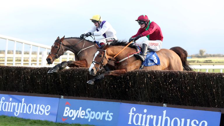 Agusta Gold ridden by jockey Danny Mullins (right) on their way to winning the John & Chich Fowler Memorial EBF Mares Chase race with Moyhenna ridden by jockey James Joseph Slevin in second at Fairyhouse Racecourse.