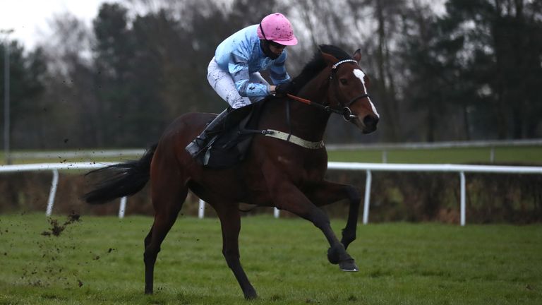 Paul O'Brien riding Eileendover (right) on their way to winning the Alan Swinbank Mares' Standard Open National Hunt Flat Race at Market Rasen Racecourse.