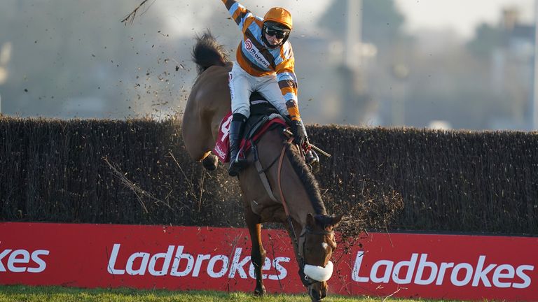 Master Tommytucker ridden by Harry Cobden smash through the last fence but remain upright to win The Ladbrokes Silviniaco Conti Chase, at Kempton Park Racecourse.