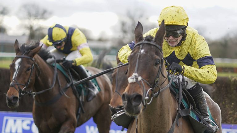Sky Pirate ridden by Jonjo O'Neill Jr (right yellow) clears the last at Warwick