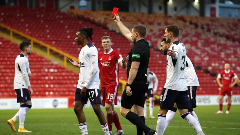 Aberdeen's Lewis Ferguson (centre) reacts to Aberdeen's Ryan Hedges (not pictured) being show a red.