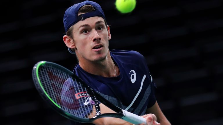 Alex de Minaur, of Australia, returns to Russia's Daniil Medvedev, during the third round of the Paris Masters tennis tournament at the Bercy Arena in Paris, Thursday, Nov. 5, 2020. (AP Photo/Thibault Camus)