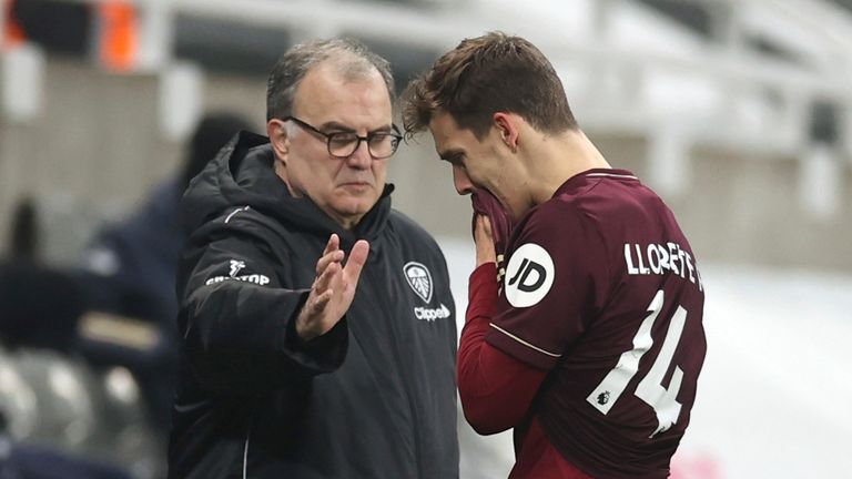 AP - Leeds United head coach Marcelo Bielsa and defender Hugo Llorente as he comes off injured against Newcastle