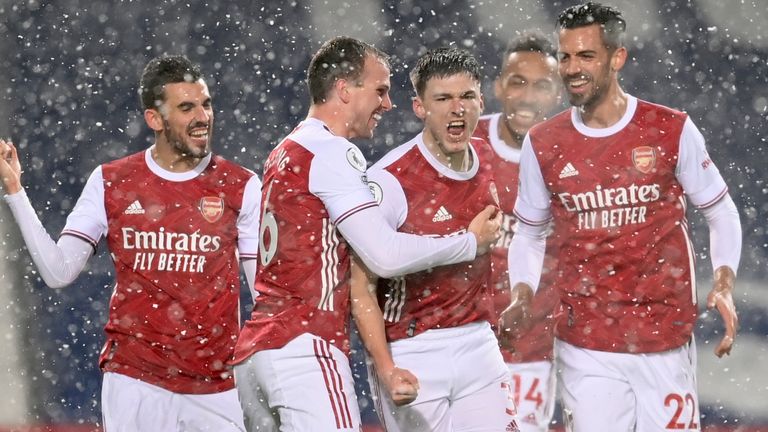 Arsenal celebrate a goal against West Brom