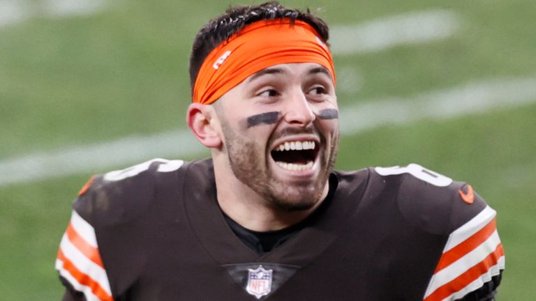 Cleveland Browns quarterback Baker Mayfield smiles as he walks off the field after an NFL football game against the Pittsburgh Steelers, Sunday, Jan. 3, 2021, in Cleveland. The Browns won 24-22. (AP Photo/Ron Schwane)