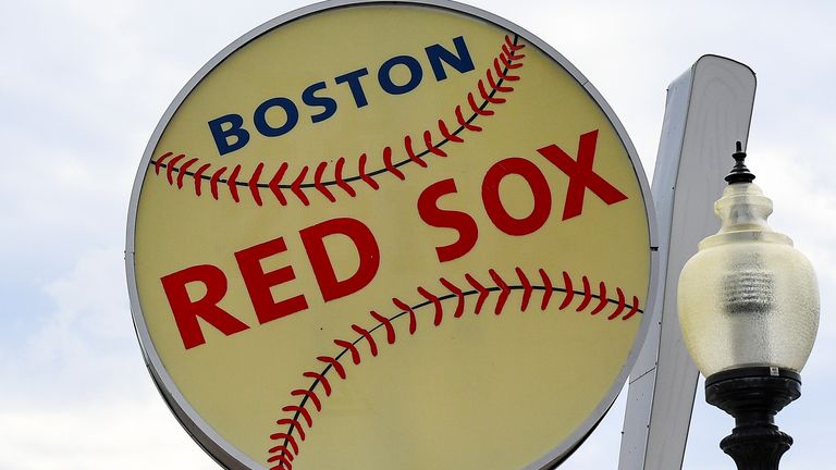 General view of a Boston Red Sox sign, outside of Fenway Park, on Thursday, July 23, 2020 in Boston, Massachusetts