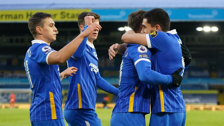 Brighton's Neal Maupay celebrates his goal against Leeds by hugging Alexis Mac Allister