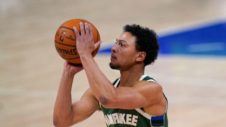 Milwaukee Bucks guard Bryn Forbes shoots during the first half of an NBA basketball game against the Detroit Pistons