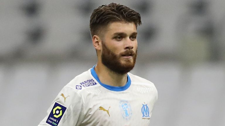 Marseille's Duje Caleta-Car jogs during the French League One soccer match between Marseille and Saint Etienne at the Stade Velodrome in Marseille, France, Thursday, Sept.17, 2020. (AP Photo/Daniel Cole)