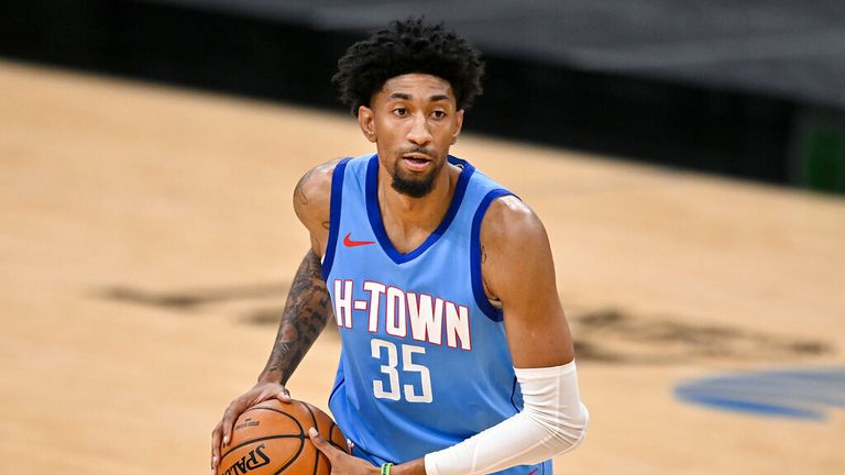 AP - Houston Rockets' Christian Wood runs up the court during the second half