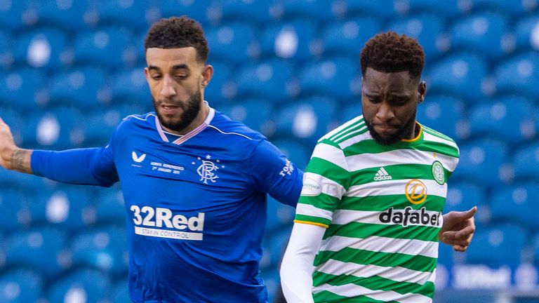 Rangers' Connor Goldson tussles with Celtic's Odsonne Edouard