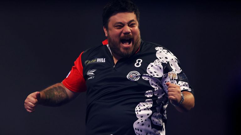 Danny Baggish celebrates winning his match during day five of the William Hill World Darts Championship at Alexandra Palace, London.