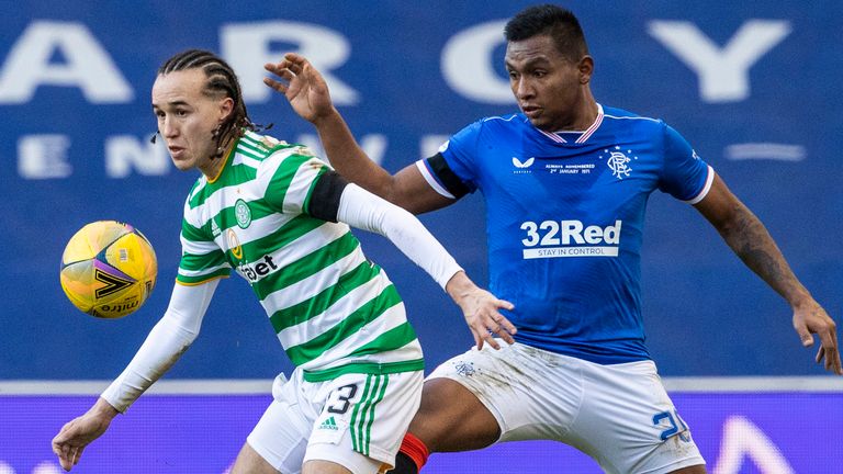 Celtic's Diego Laxalt holds off Rangers' Alfredo Morelos