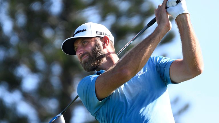 Dustin Johnson hits during the second round of the Tournament of Champions golf event, Friday, Jan. 8, 2021, at Kapalua Plantation Course in Kapalua, Hawaii. (Matthew Thayer/The Maui News via AP)