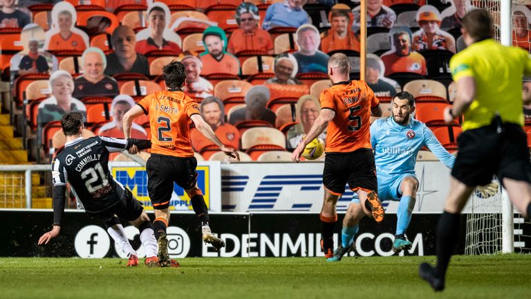 St Mirren's Dylan Connolly scores his side's fourth goal at Tannadice