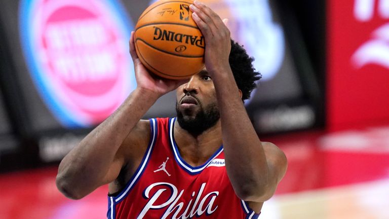 Philadelphia 76ers center Joel Embiid shoots during the second half of an NBA basketball game against the Detroit Pistons, Saturday, Jan. 23, 2021, in Detroit. 