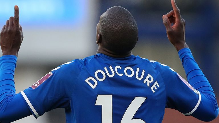 Abdoulaye Doucoure celebrates after scoring in extra-time 