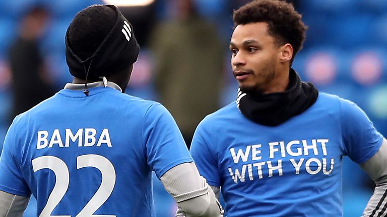 Cardiff City players wear t-shirts in support of Sol Bamba