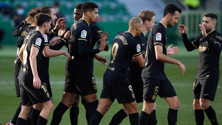 Frenkie de Jong celebrates with team mates