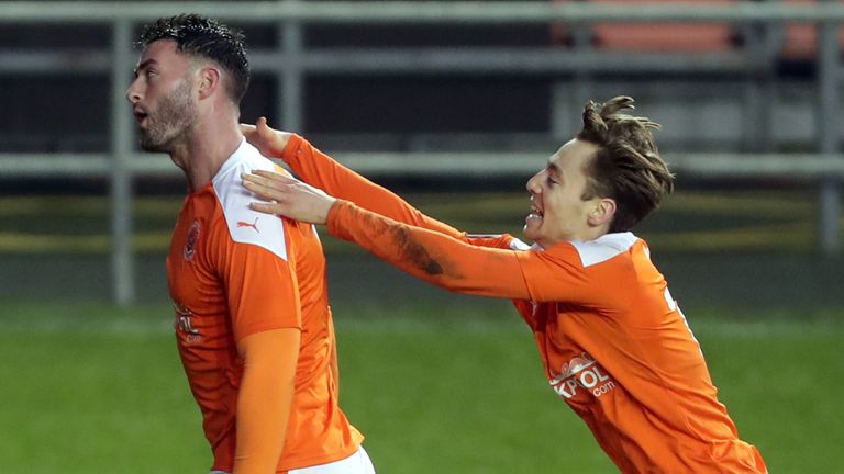 Gary Madine celebrates after giving Blackpool the lead against West Brom