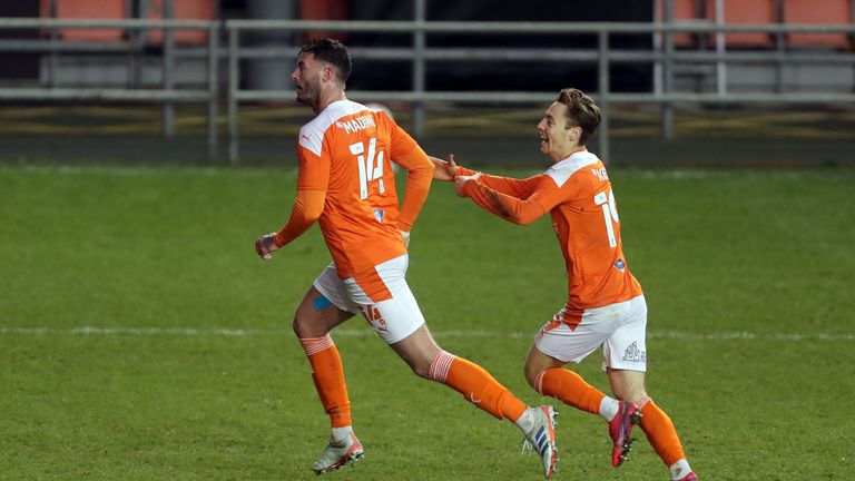 Gary Madine had put Blackpool 2-1 up at Bloomfield Road in normal time